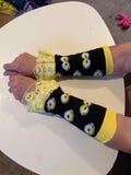 Fandom lace trimmed arm warmers. Priced per pair. Hand wash.