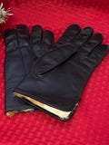 Men’s vintage black leather, fur lined gloves. Marked as a size large. Made in the Philippines. Like new condition.