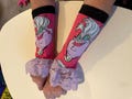 Fandom lace trimmed arm warmers. Priced per pair. Hand wash.
